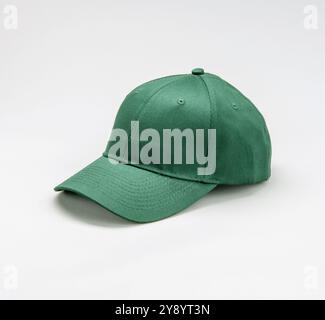 Side view of Green Baseball cap on grey background Stock Photo