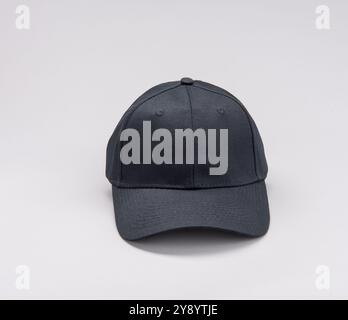 Black Baseball cap front on grey background Stock Photo