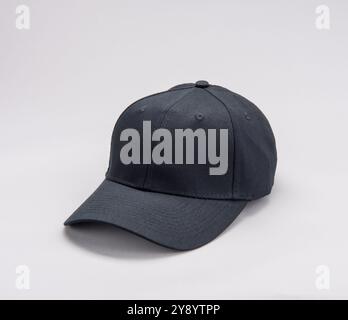 Black Baseball cap on grey background Stock Photo