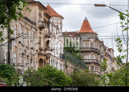 Old classicistic residential houses at the Rua Alexandre Herculano in Coimbra city center, Portugal Stock Photo