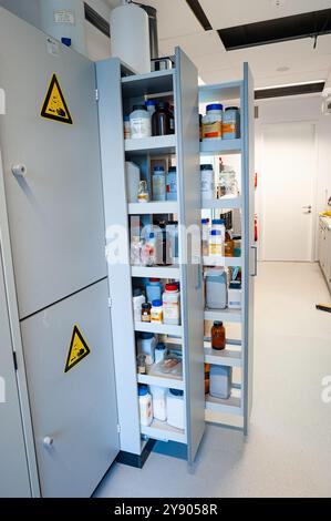 Stock cabinet of chemicals in a high school laboratory Stock Photo