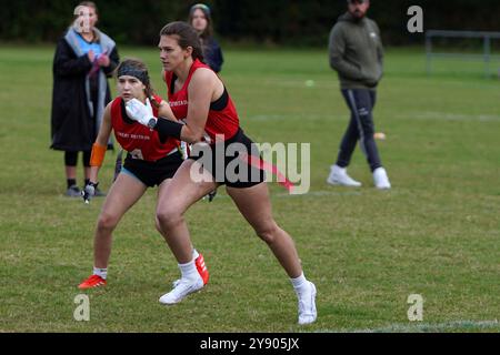 Female flag football defensive rushers in action at the Pantherbowl 2024 Stock Photo