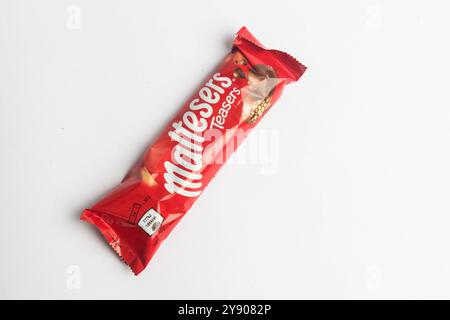 London, United Kingdom, 26th September 2024:- A view of the confectionary Malteser Teasers bar, against a white background Stock Photo