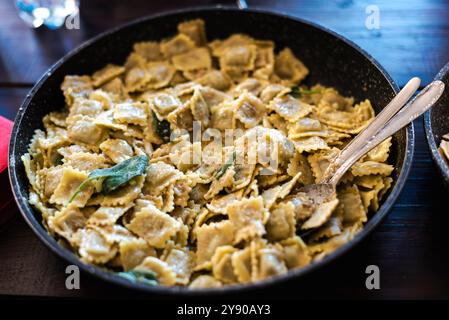 Traditional pan of Ravioli burro e salvia, butter and sage, a Sunday plate in Piemonte. Stock Photo