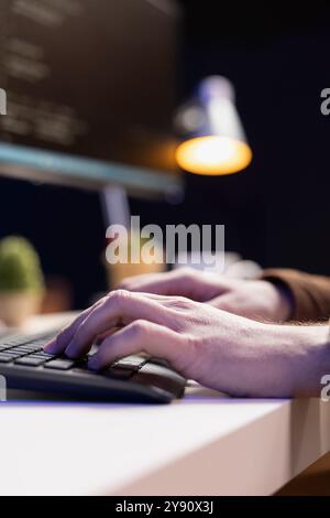Computer scientist designing and developing software applications using programming languages. IT professional implementing and maintaining company systems, close up shot Stock Photo