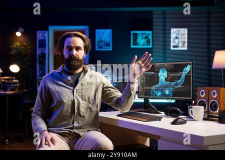 Sentient AI taking control of creator, moving his limbs, starting robot uprising posing risk to mankind. Artificial intelligence possessing programmer, planning to do human extinction Stock Photo