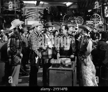 Kewin Mathews, Guy Madison, Brian Keith, William Conrad, Alvy Moore, on-set of the western film, 'Five Against The House', Columbia Pictures, 1955 Stock Photo