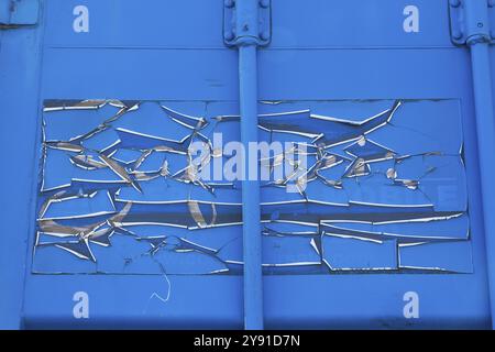 Close-up of cracked and peeling blue paint on metal shipping container, Quebec, Canada, North America Stock Photo