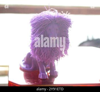 Art object lion printed on 3D printer. Abstract small toy model purple lion created on 3d printer. FDM 3D Printing technology. Concept new 3D Printing. Additive modern new progressive technologies Stock Photo