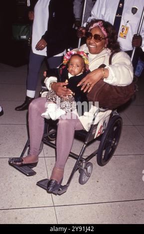 **FILE PHOTO** Cissy Houston Has Passed Away. Bobbi Kristina Brown and Cissy Houston at Los Angeles International Airport in Los Angeles, California. 1994 Credit: Ralph Dominguez/MediaPunch Stock Photo