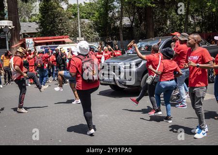 Johannesburg, South Africa. 7th Oct, 2024. Workers affiliated with the Congress of South African Trade Unions (COSATU) are pictured during a protest in Johannesburg, South Africa, Oct. 7, 2024. Thousands of workers affiliated with COSATU, the country's largest labor union federation, took to the streets on Monday to express their concerns about the weak economy and high cost of living. Credit: Shiraaz Mohamed/Xinhua/Alamy Live News Stock Photo