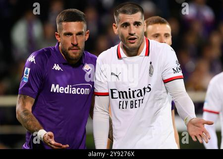 Cristiano Biraghi of ACF Fiorentina and Alvaro Morata of AC Milan during the Serie A football match between ACF Fiorentina and AC Milan at Artemio Franchi stadium in Firenze (Italy), October 6, 2024. Stock Photo