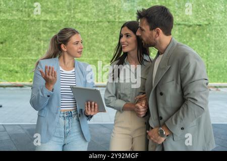 Group of young businesspeople stock market and exchange experts, leaders in modern science, finance and economy standing outside of office building. S Stock Photo