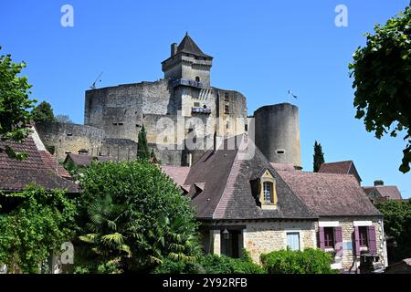 Castelnaud, France; 18 July 2024: Chateau de Castelnaud a Medieval castle in the Dordogne, seen from the village below Stock Photo