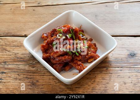 Korean Style Spicy Sticky Crispy Chicken Strings Stock Photo