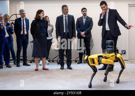 Marseille, France. 07th Oct, 2024. Clara Chappaz, Secretary of State to the Minister for Higher Education and Research, in charge of Artificial Intelligence and Digital Technologies, attends a demonstration of the Boston Dynamics robot dog alongside Rodolphe Saade in the offices of TANGRAM, CMA CGM's training centre in Marseille, France on 07 October 2024. Photo by Laurent Coust/ABACAPRESS.COM Credit: Abaca Press/Ģ����ý Live News Stock Photo