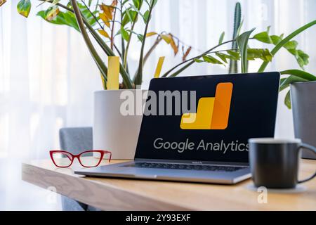 Prague, Czech Republic - September 20, 2024: Laptop with Google Analytics on screen at workspace Stock Photo