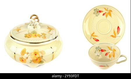 Vintage porcelain tableware: coffee cup with saucer and elegant candy bowl isolated on white background. Collage. Wide photo. Stock Photo