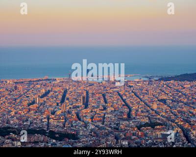 Cityscape at sunset seen from Mount Tibidabo, Barcelona, Catalonia, Spain, Europe Stock Photo