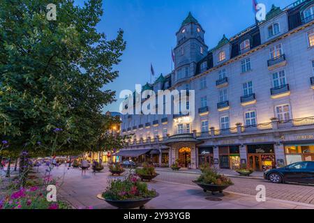 View of Grand Hotel on Karl Johans Gate at dusk, Oslo, Norway, Scandinavia, Europe Stock Photo