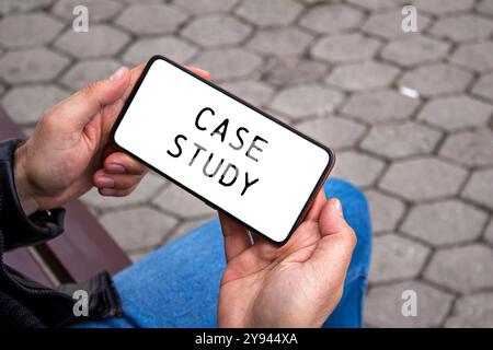 Case study message written on smartphone screen. Conceptual case study symbol. Copy space. Stock Photo