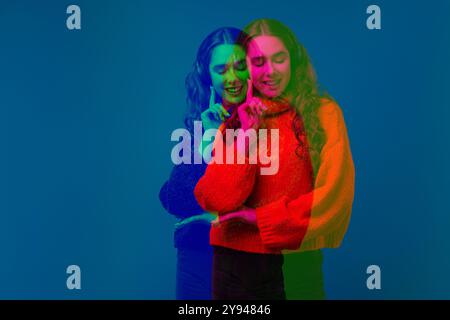 Glitch Double Exposure portrait of a girl listening to music with wireless headphones on a blue background Stock Photo