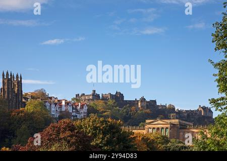 Autumnal view of Edinburgh Castle with National Galleries and Ramsay Gardens; Scotland; UK Stock Photo