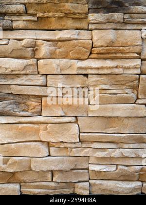 Background of stone wall texture. Stone wall background for design and decoration. Stock Photo