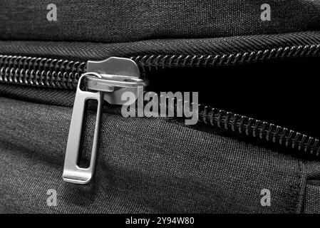 Lock with zipper on clothes. Black padlock  with zipper Stock Photo