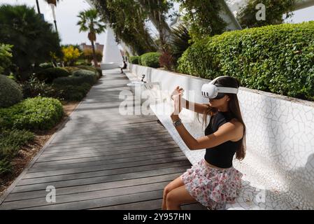 Immerse yourself in a captivating Virtual Reality Experience set in a beautiful outdoor environment Stock Photo