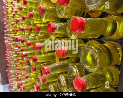 Closeup photo of aesthetic wall of a japan restaurant made from empt wine bottles Stock Photo