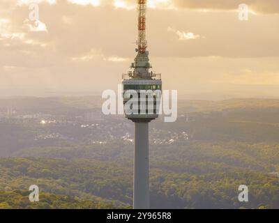 Close-up of the television tower with forest and hills in the background in the golden evening sun, Stuttgart, Germany, Europe Stock Photo