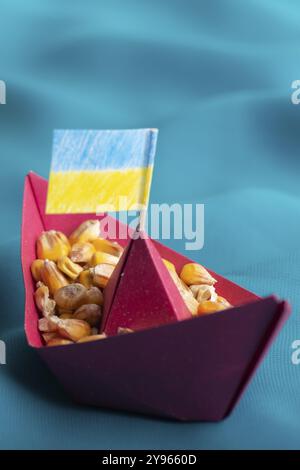 Ships with Ukrainian maize grain made of paper concept, food photography, food photography Stock Photo