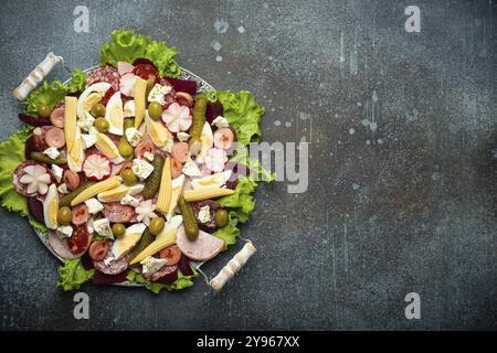 Close up of Fiambre, salad of Guatemala, Mexico and Latin America top view with cold cuts and pickled vegetables. Festive dish for All Saints Day (Day Stock Photo