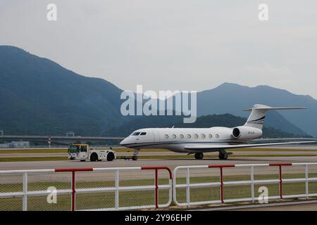 Private jet on the tarmac at HKIA airport Stock Photo