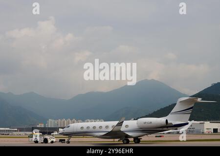 Private jet on the tarmac at HKIA airport Stock Photo