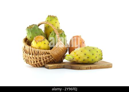 A collection of vibrant prickly pears displayed in a basket and on a wooden board. Perfect for concepts of healthy eating, exotic fruits, and natural Stock Photo