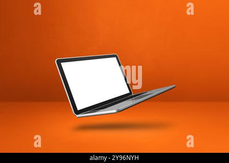 Blank computer laptop floating over an orange background. 3D isolated illustration. Horizontal template Stock Photo