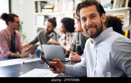 Team of multiethnic diverse young software developers talk, discuss an AI project. Business startup Stock Photo