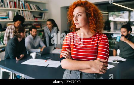 Diverse startup people on meeting having fun during brainstorming new ideas for their new project. Stock Photo