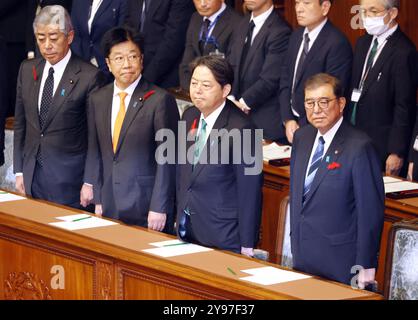 Tokyo, Japan. 9th Oct, 2024. Japanese Prime Minister Shigeru Ishiba (R) accompanied by Chief Cabinet Secretary Yoshimasa Hayashi (2nd R), Finance Minister Katsunobu Kato (2nd L) and Foreign Minister Takeshi Iwaya (L) reacts as he dissolved Lower House at Lower House's plenary session at the Natkional Diet in Tokyo on Wednesday, October 9, 2024. Japan's general election will be held on October 27. (photo by Yoshio Tsunoda/AFLO) Stock Photo