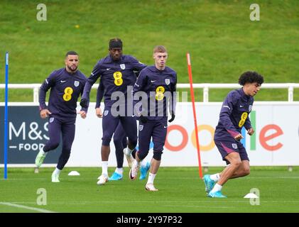 England's Rico Lewis and Cole Palmer during a training session at St ...