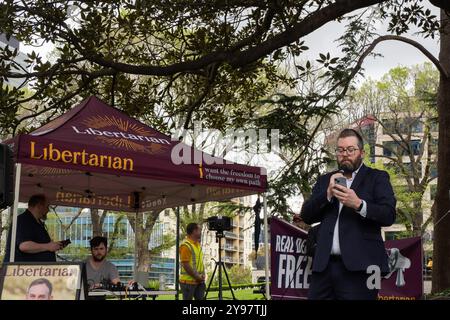 Melbourne, Australia. 05th Oct, 2024. Libertarian Party member Chris Needham seen during the rally. The Australian Libertarian Party held a public rally at Flagstaff Gardens espousing party policy; particularly opposition to the federal government's proposed Communications Legislation Amendment (Combatting Misinformation and Disinformation) Bill 2024, and the state of Victoria's proposed changes to anti-vilification laws. (Photo by Alex Zucco/SOPA Images/Sipa USA) Credit: Sipa USA/Alamy Live News Stock Photo