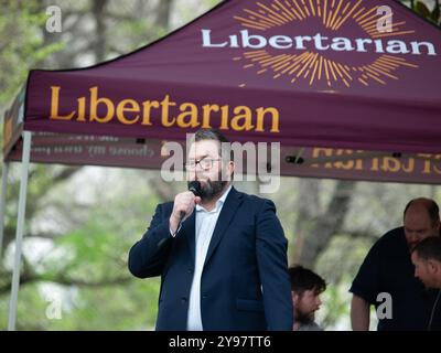 Melbourne, Australia. 05th Oct, 2024. Libertarian Party member Chris Needham, seen during the rally. The Australian Libertarian Party held a public rally at Flagstaff Gardens espousing party policy; particularly opposition to the federal government's proposed Communications Legislation Amendment (Combatting Misinformation and Disinformation) Bill 2024, and the state of Victoria's proposed changes to anti-vilification laws. (Photo by Alex Zucco/SOPA Images/Sipa USA) Credit: Sipa USA/Alamy Live News Stock Photo