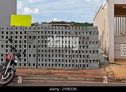 Stacked cement bricks on sidewalkin Ribeirao Preto, Sao Paulo, Brazil Stock Photo