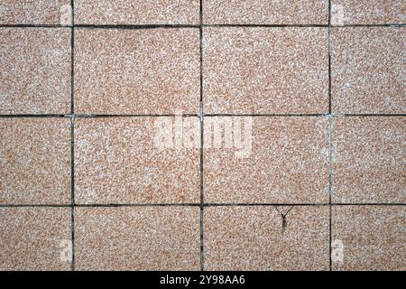 Detail of the polished stone blocks on the exterior wall of an old building Stock Photo