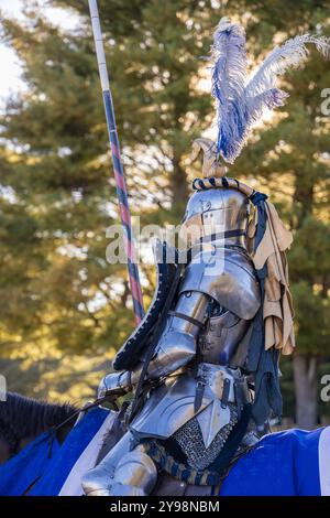 A medieval knight sitting on a horse wearing shining armour Stock Photo ...