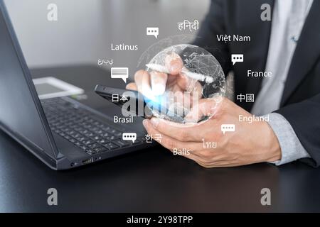 Translator app, language course and e-learning concept. Person use smartphone with Translator app, translation or translate on the mobile app worldwid Stock Photo