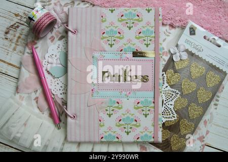 Scrapbooking handmade textile baby photo album and accessorize Stock Photo