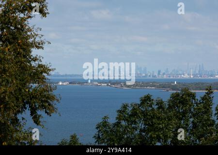 A view across the bay toward Sandy Hook and the New York City skyline. Photos taken from the Mt. Mitchell Scenic Overlook. Stock Photo